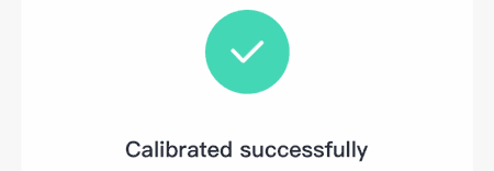 Screenshot showing a 'Calibrated successfully' message with a green tick icon.