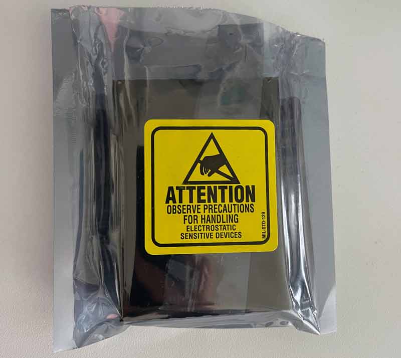 Photo showing the industrial packaging of the U-56n: arrived in an anti-static bag with a yellow warning sticker.